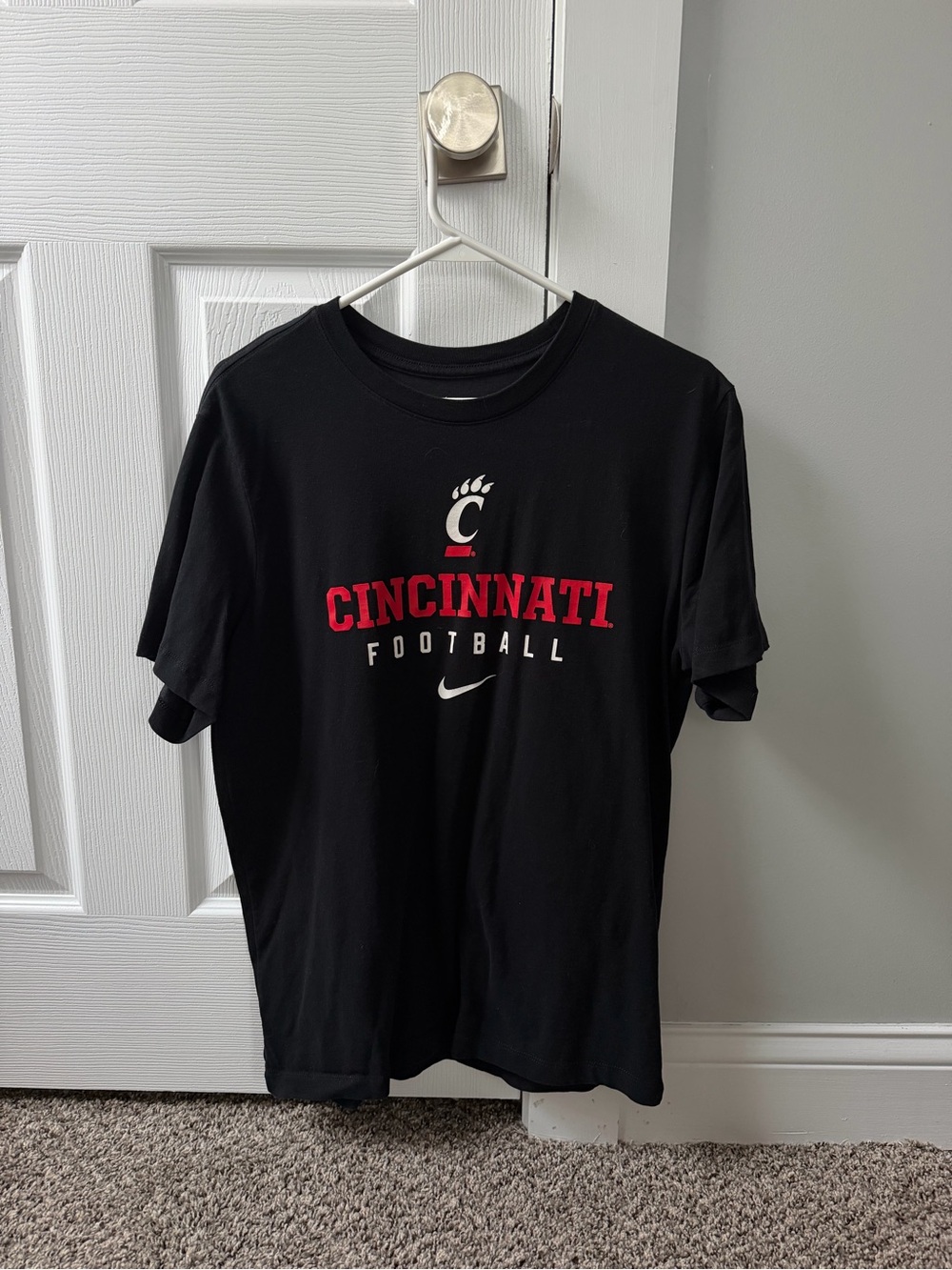 Nike Black Cincinnati Football Graphic Tee with Red Lettering